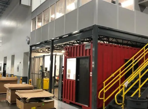 Modular mezzanine office in manufacturing plant